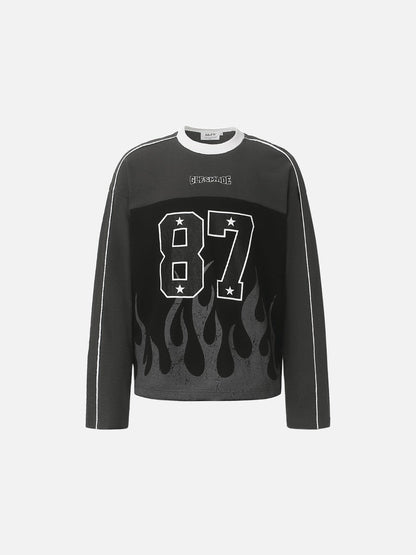 87 flame graphic long-sleeve top shown from the front