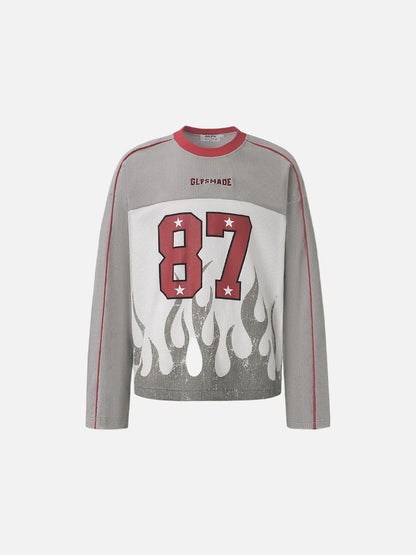 Front view of the 87 flame graphic on a long-sleeve top