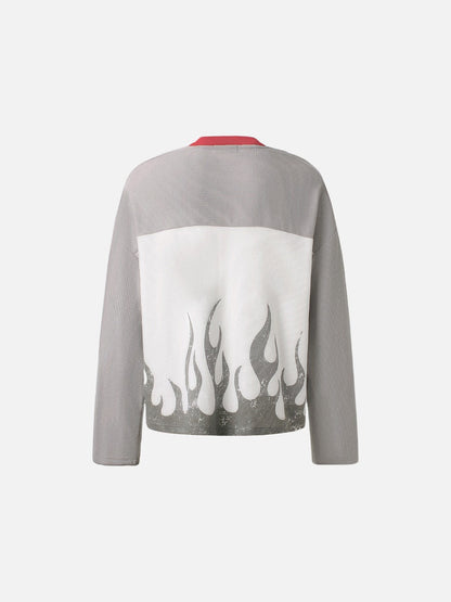 Side view of the 87 flame graphic long-sleeve top