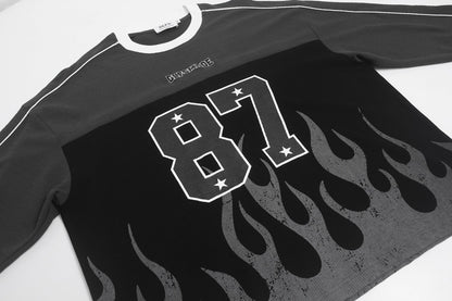 Full product view of the 87 flame graphic long-sleeve top