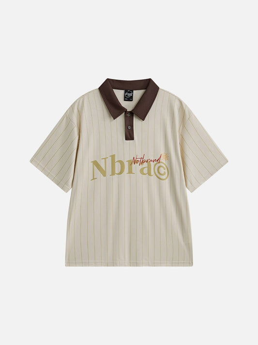 Front view of oversized striped polo shirt with graphic detail
