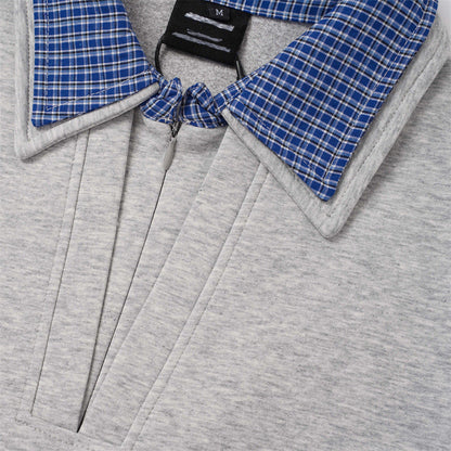 Soft long-sleeve sweatshirt with a contrasting plaid collar