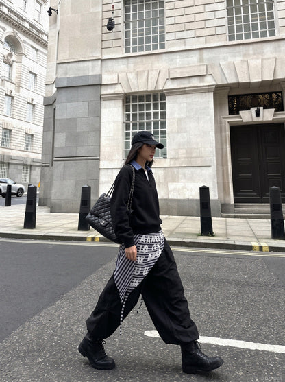 Long-sleeve sweatshirt showing the plaid collar detail