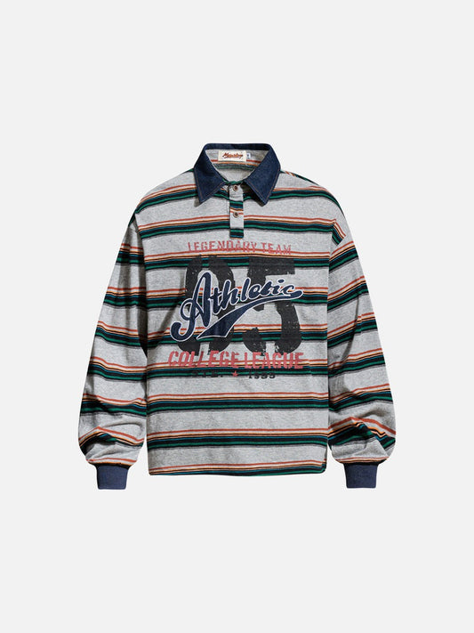 Front view of an oversized striped graphic polo shirt with distressed 65 print