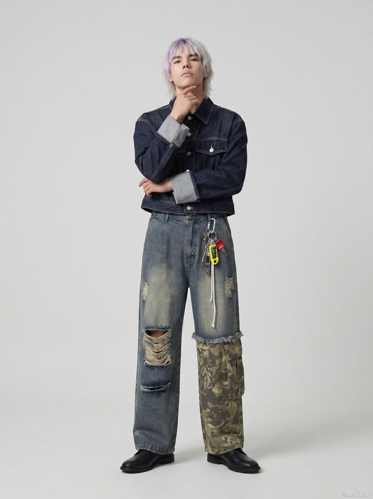 Close-up of the denim texture and camouflage print