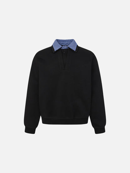 Close-up of the contrasting plaid collar on the sweatshirt