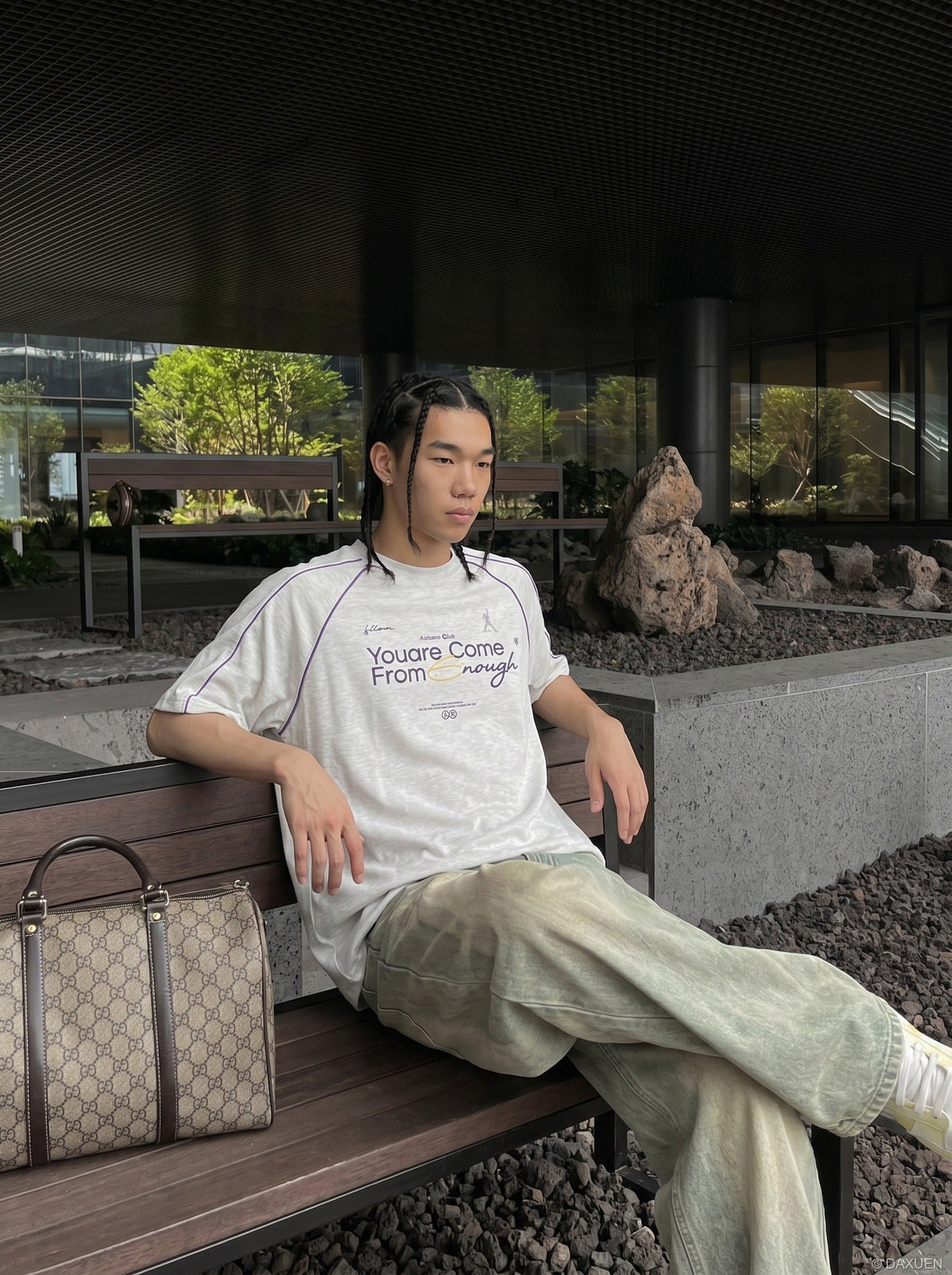 Close-up of crew neck on oversized graphic T-shirt