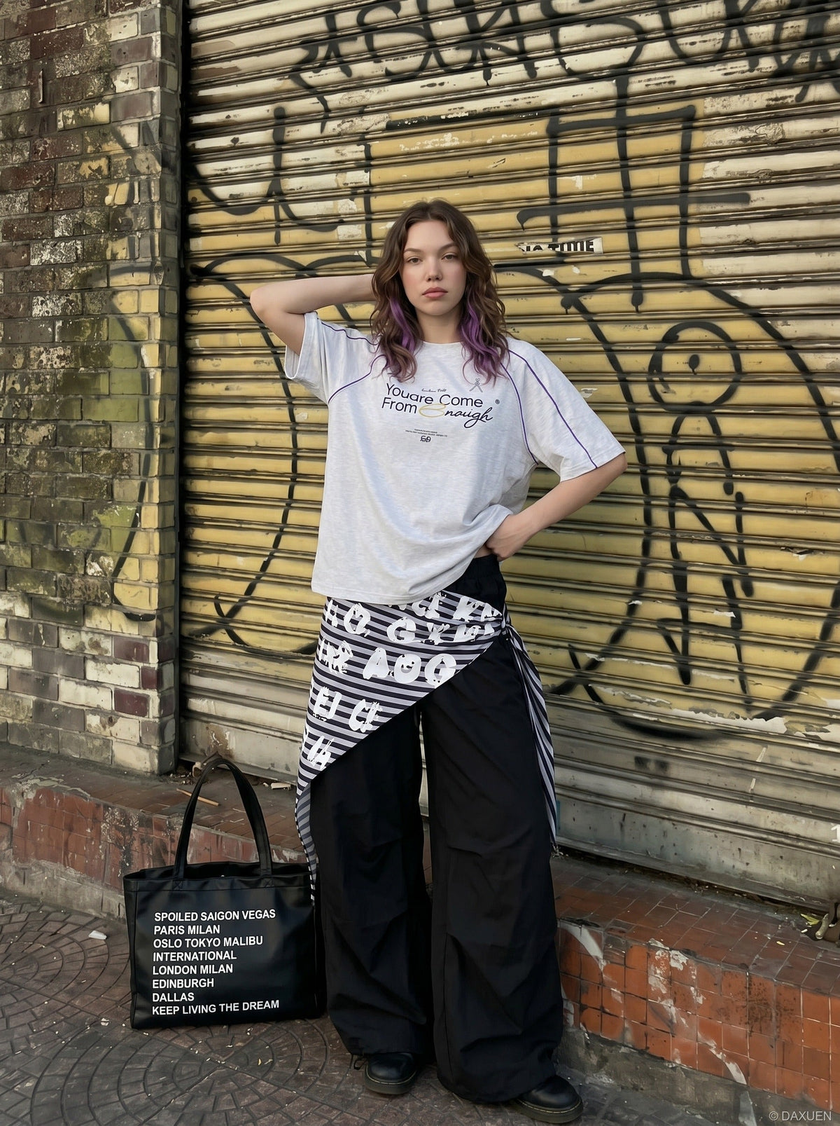 Detail of raglan sleeve seam on graphic T-shirt