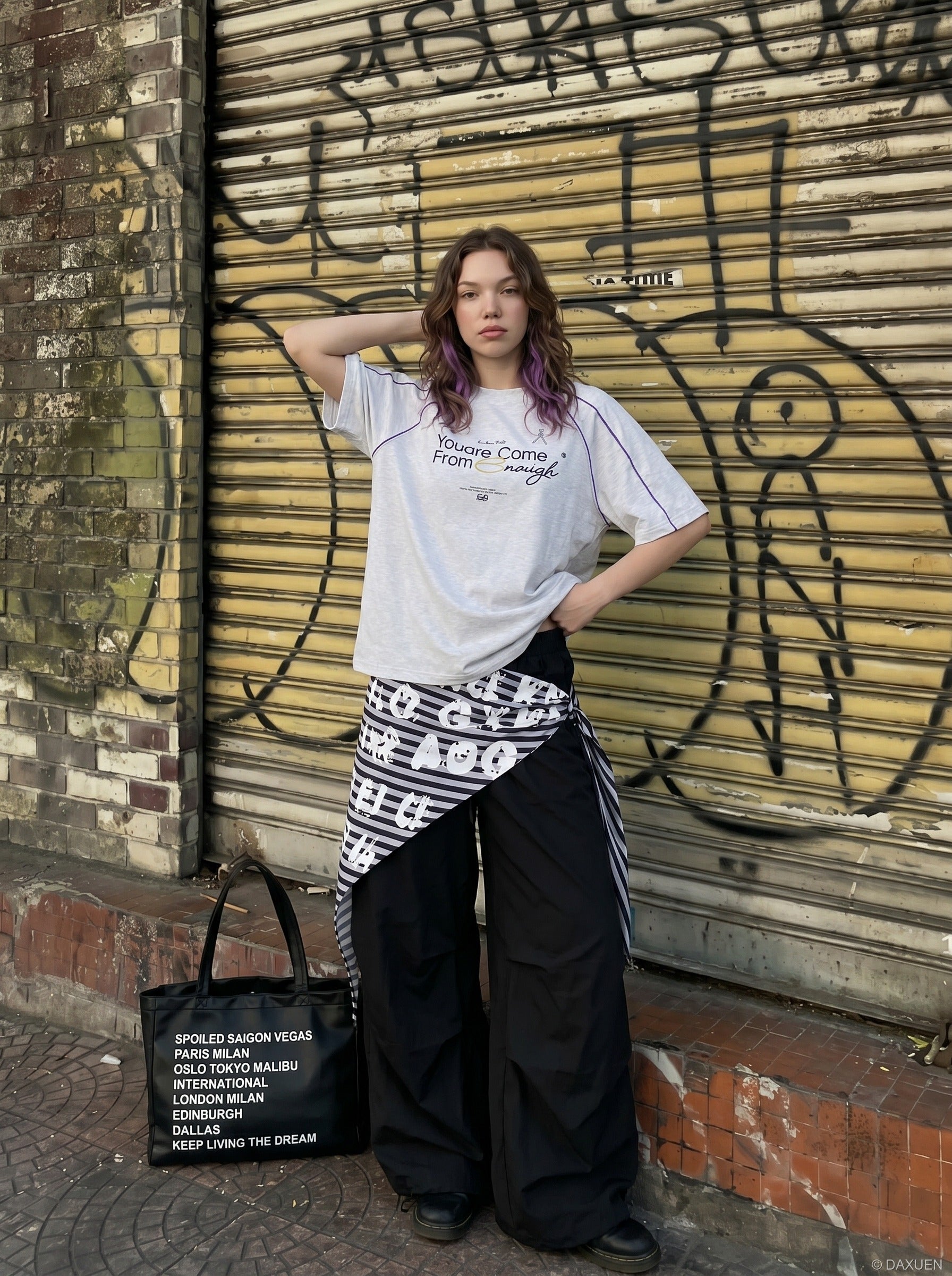 Detail of raglan sleeve seam on graphic T-shirt