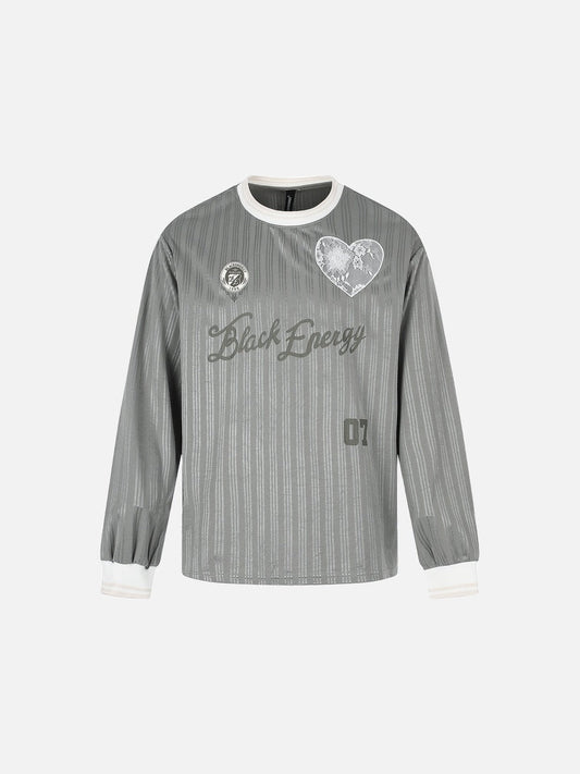 Front view of oversized jersey T-shirt with embroidered crest