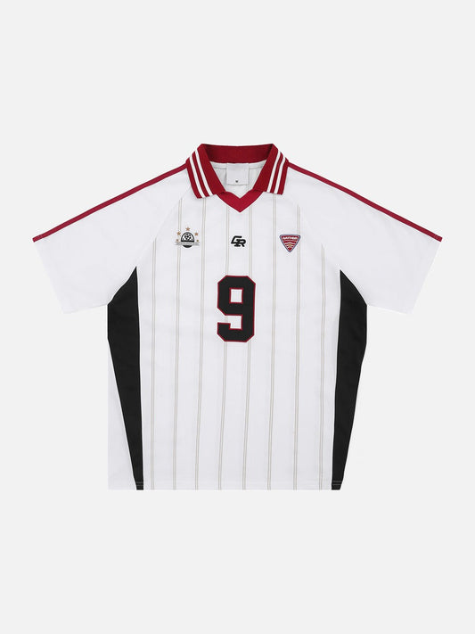 Front view of football graphic jersey polo shirt with embroidered soccer ball detail