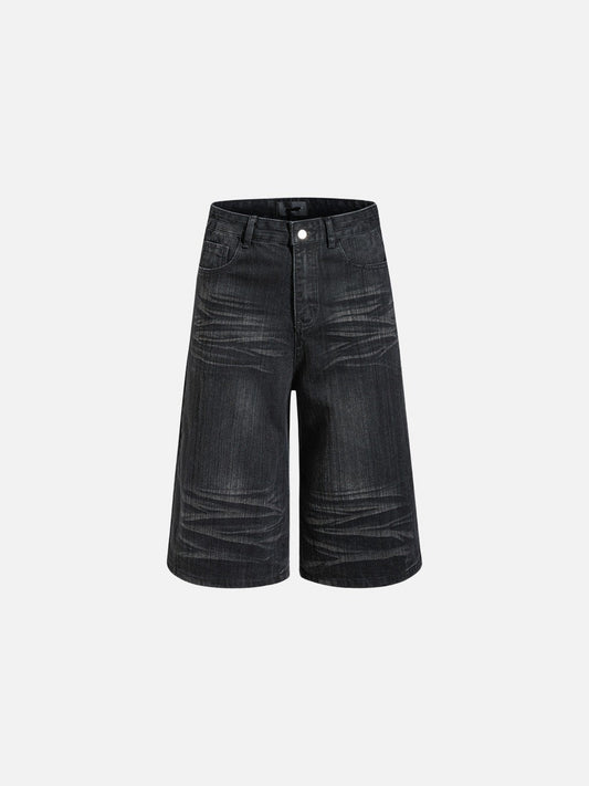 Front view of wide-leg denim shorts in faded black