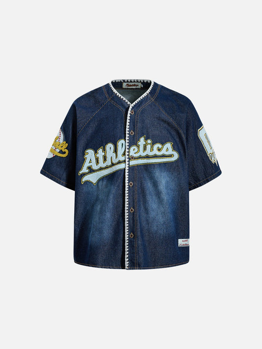 Front view of dark blue denim baseball jersey shirt with button fastening