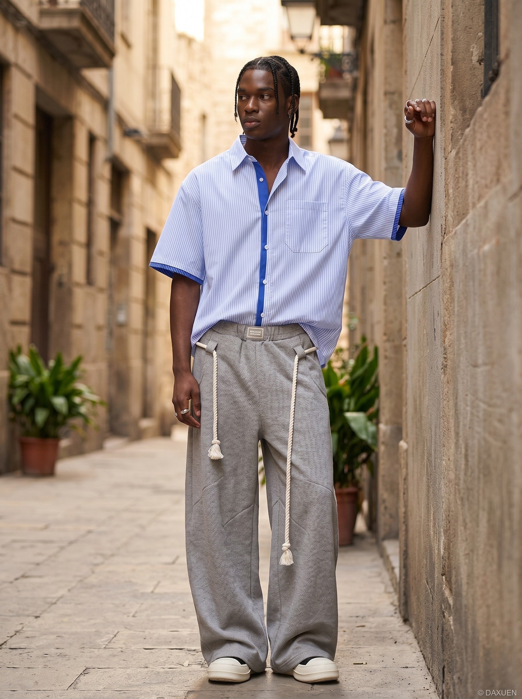 Side view of relaxed fit striped button-up shirt