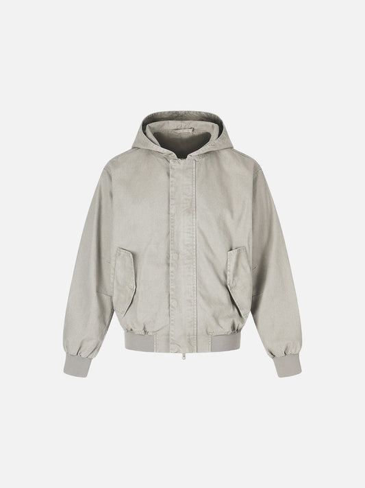 Front view of light grey hooded bomber jacket in washed cotton