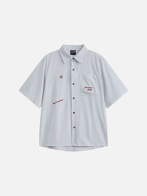 Front view of an oversized striped button-down shirt with long sleeves