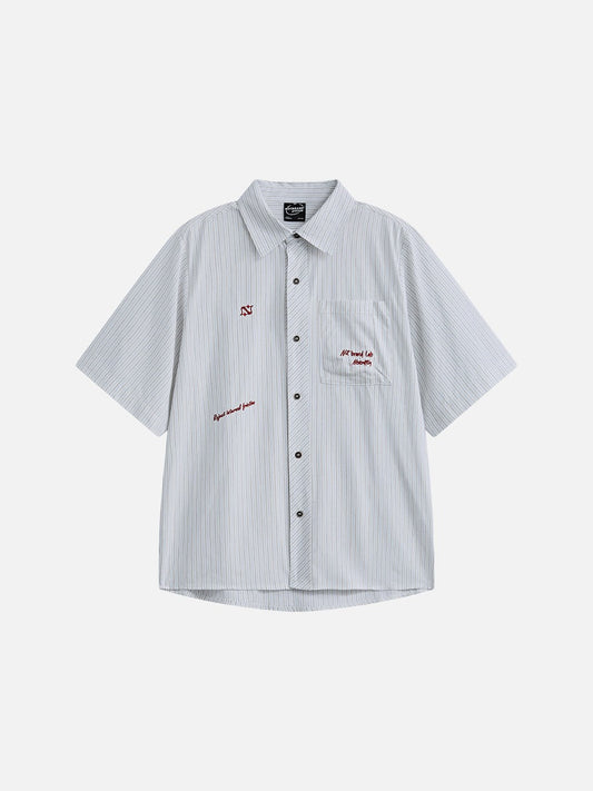 Front view of an oversized striped button-down shirt with long sleeves