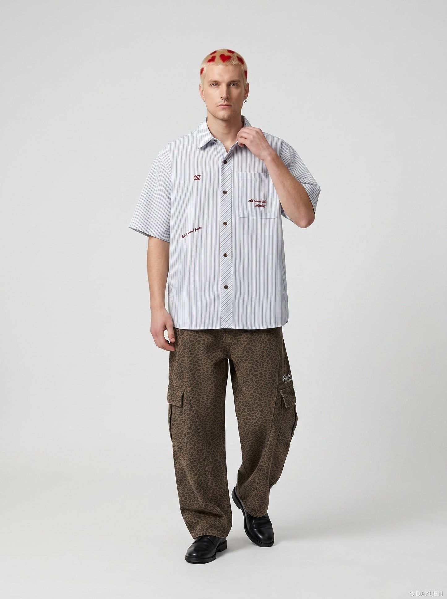 Oversized striped button-down shirt worn on a model from the back