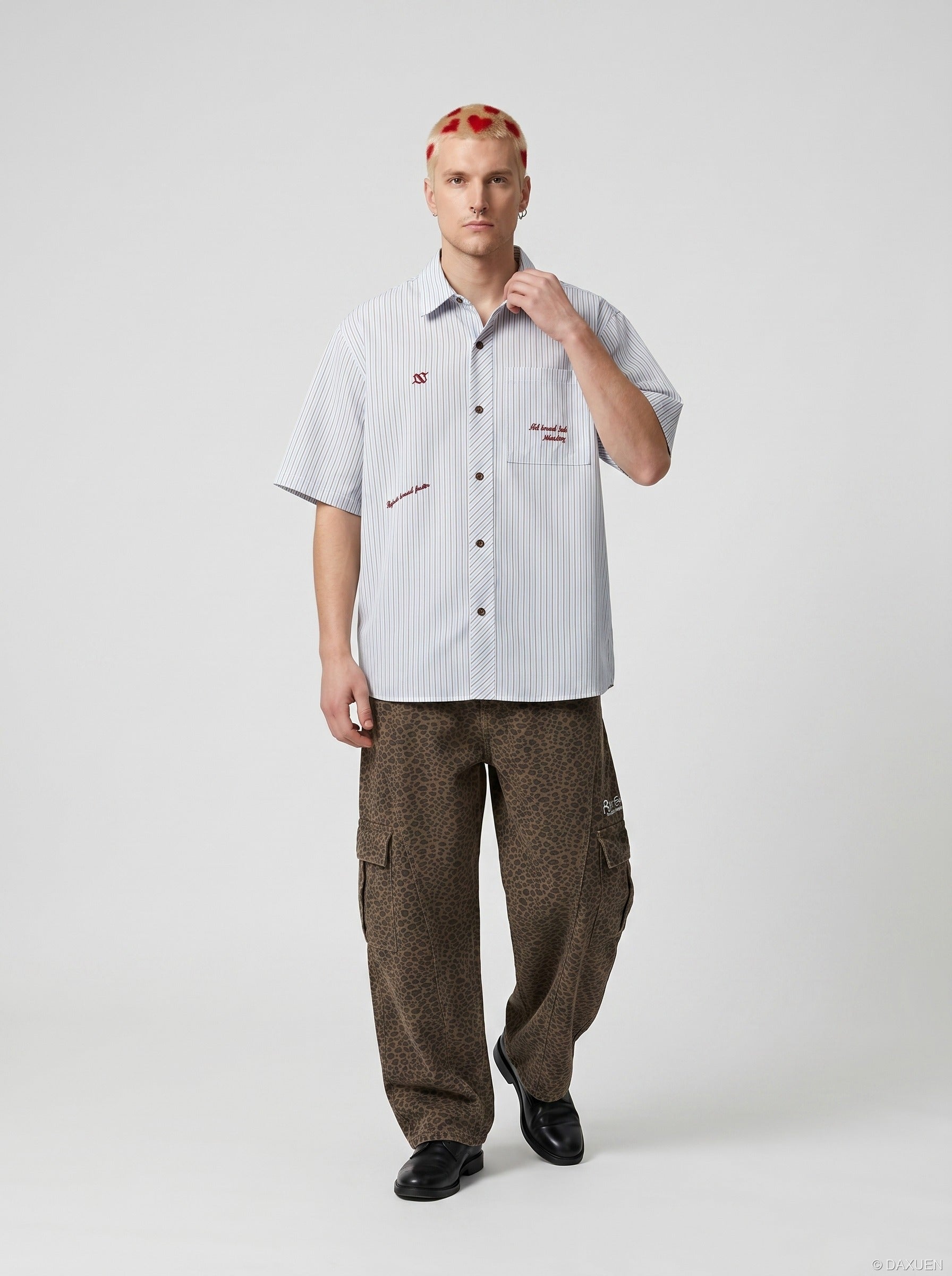 Oversized striped button-down shirt worn on a model from the back