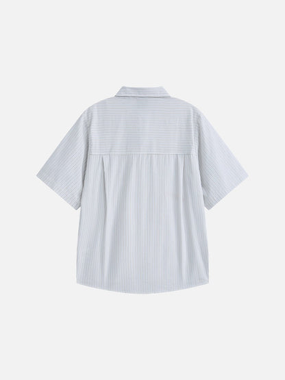 Rear view of the oversized striped button-down shirt