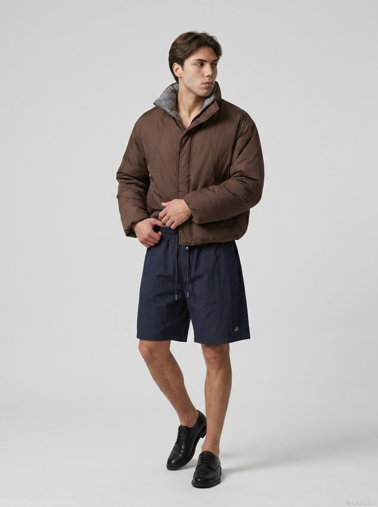 Fabric texture of relaxed fit cargo shorts with embroidery