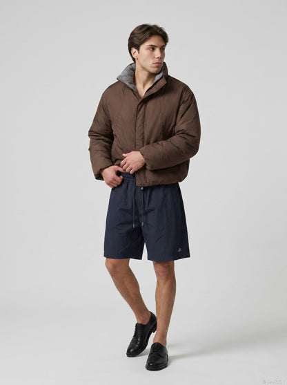 Fabric texture of relaxed fit cargo shorts with embroidery
