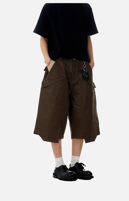 Front view of wide-leg capri trousers with V-cut hem
