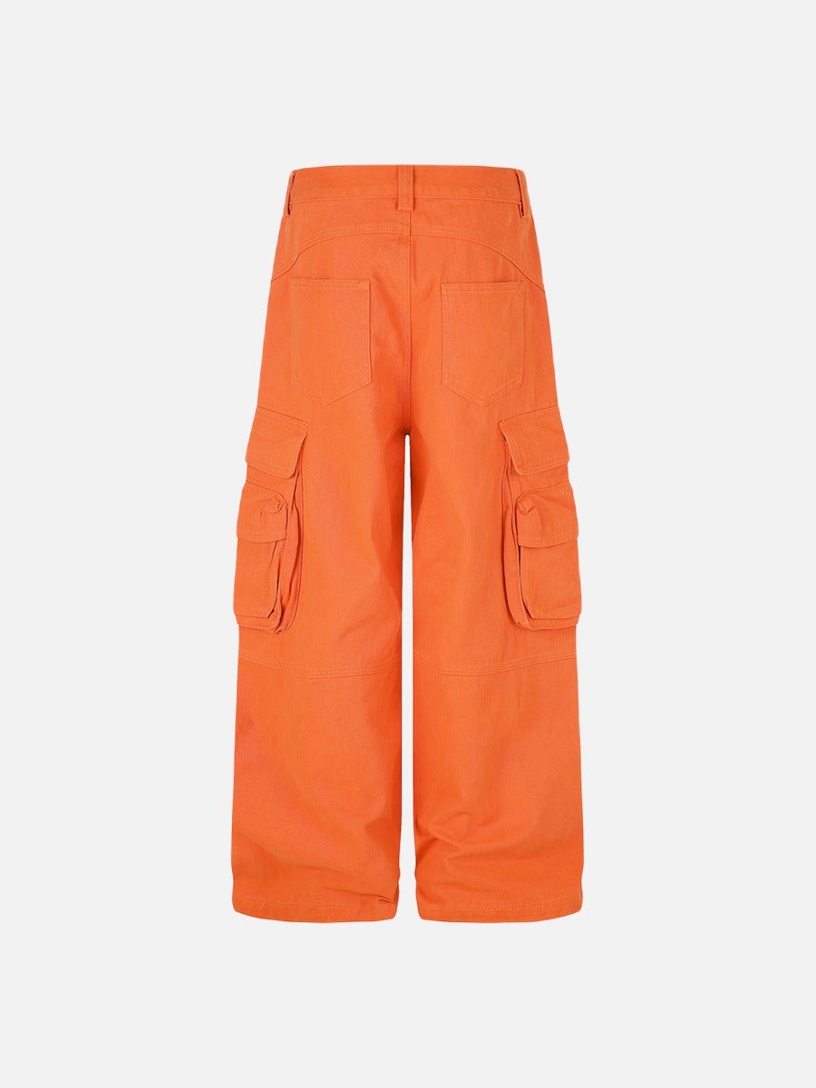 Close-up of the cargo pocket detail on orange trousers