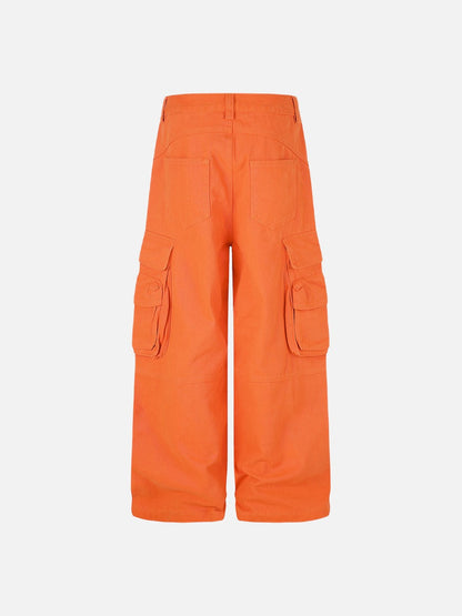 Close-up of the cargo pocket detail on orange trousers