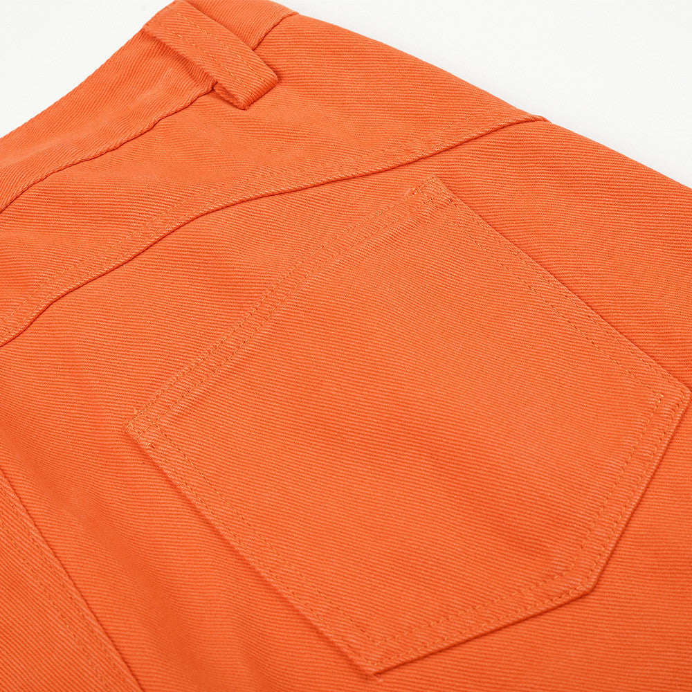 Orange wide-leg cargo trousers styled for a casual outfit