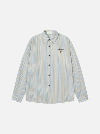 Front view of a striped button-up shirt in a relaxed fit cotton blend