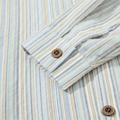 Close-up of the button placket on the vertically striped shirt