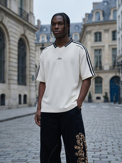 Front detail of V-neckline on oversized T-shirt