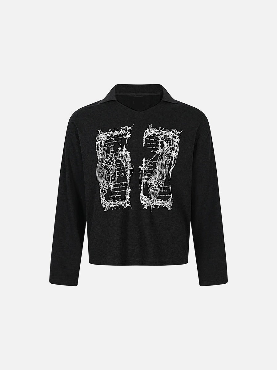 Back view of oversized graphic knit top showing wing-inspired graphic detail