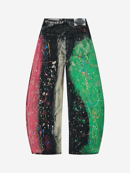Front view of paint-splatter wide-leg denim jeans