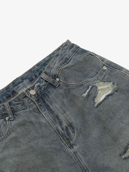 Back view of high-waisted ripped wide-leg jeans