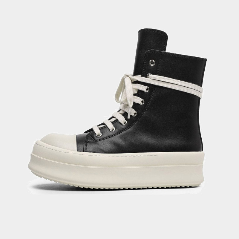Platform high top sneakers shown from the side with a convenient zip fastening