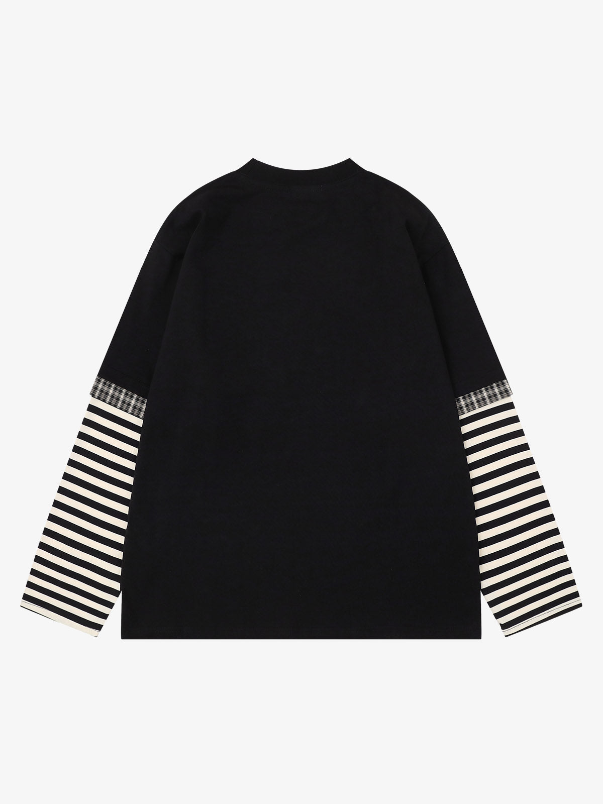 Close-up of graphic detail on oversized striped long sleeve T-shirt