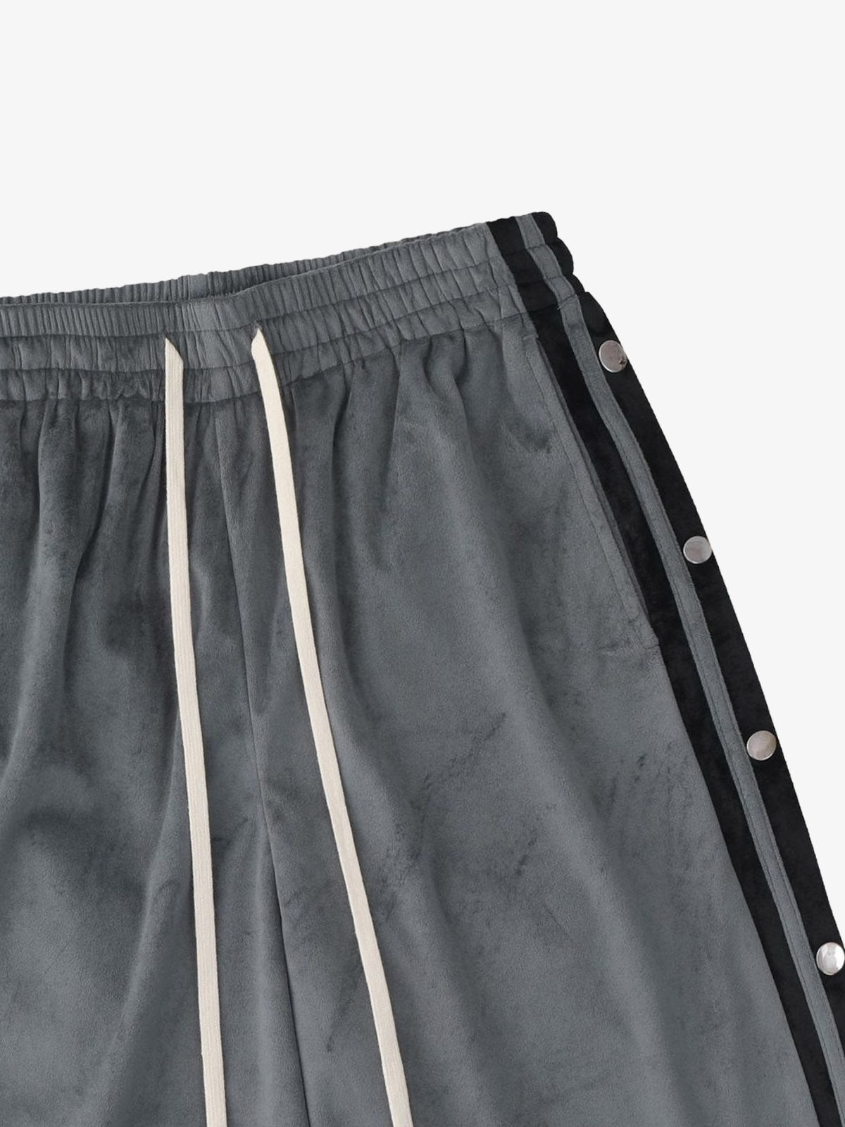 Back angled view of suede athletic shorts