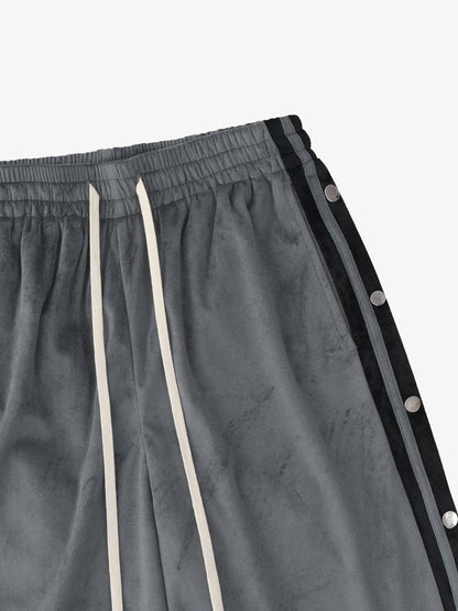 Back angled view of suede athletic shorts