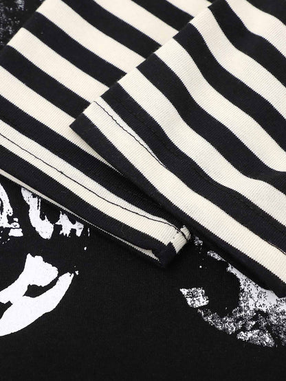 Fabric close-up of dark striped oversized long sleeve graphic T-shirt