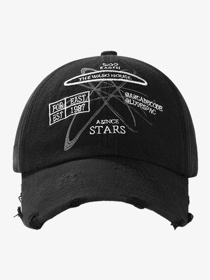 Angled view of embroidered baseball cap with distressed detailing