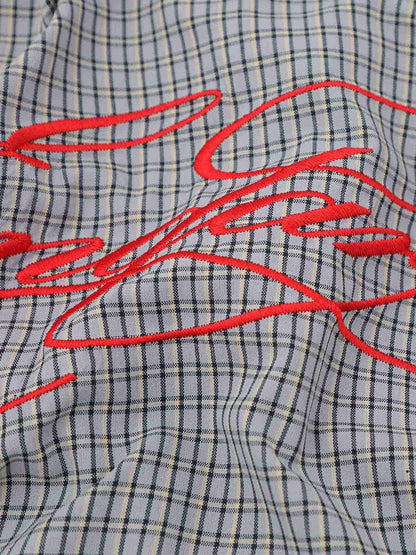 Side view of men's checked cotton blend shirt