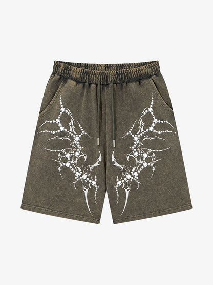 Side view of distressed rhinestone shorts for women