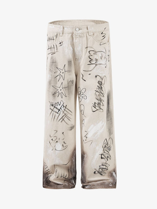 Distressed graffiti baggy jeans with an elastic waist