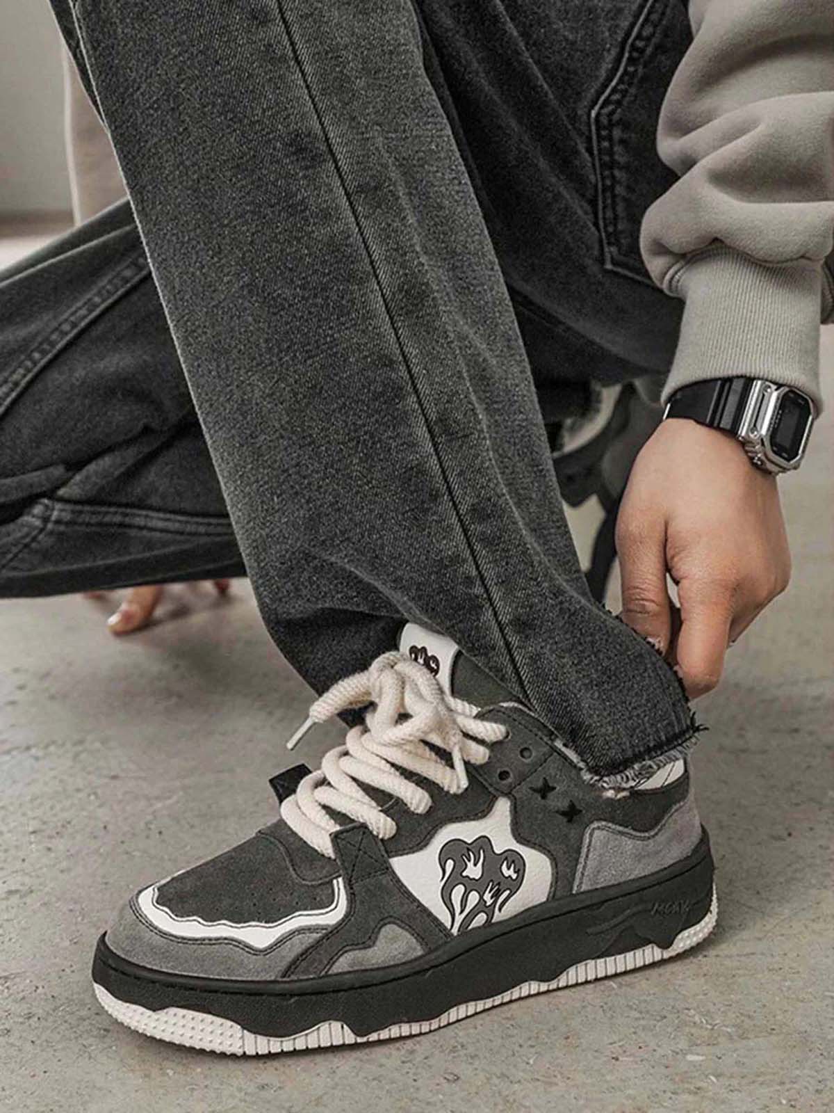 Detailed view of the durable sole on camouflage street trainers