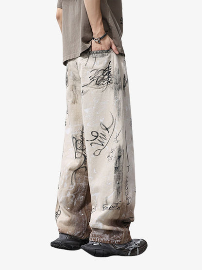 Full-length view of distressed graffiti baggy jeans