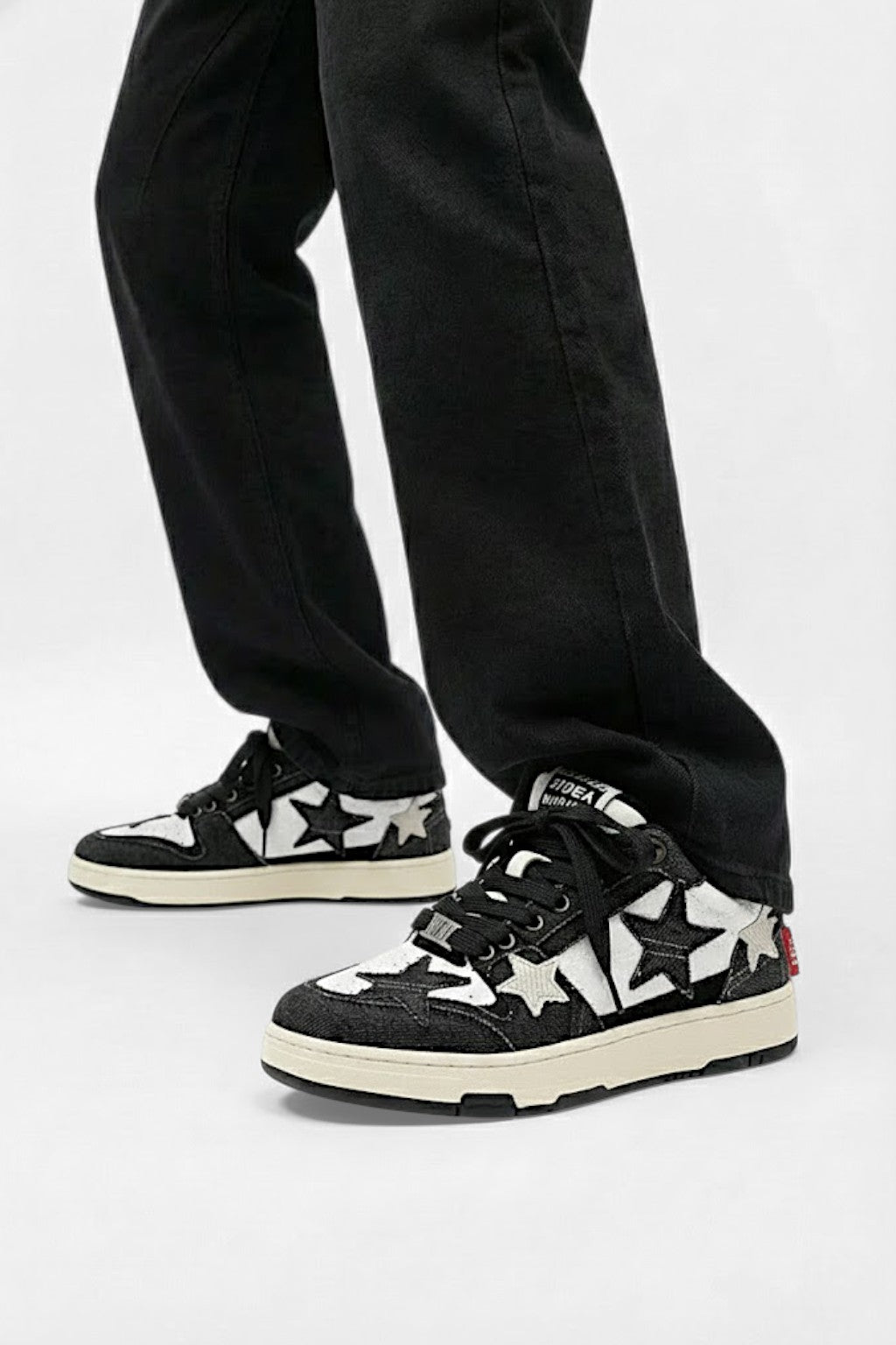 Close-up view of the trainers showcasing their streetwear-inspired style