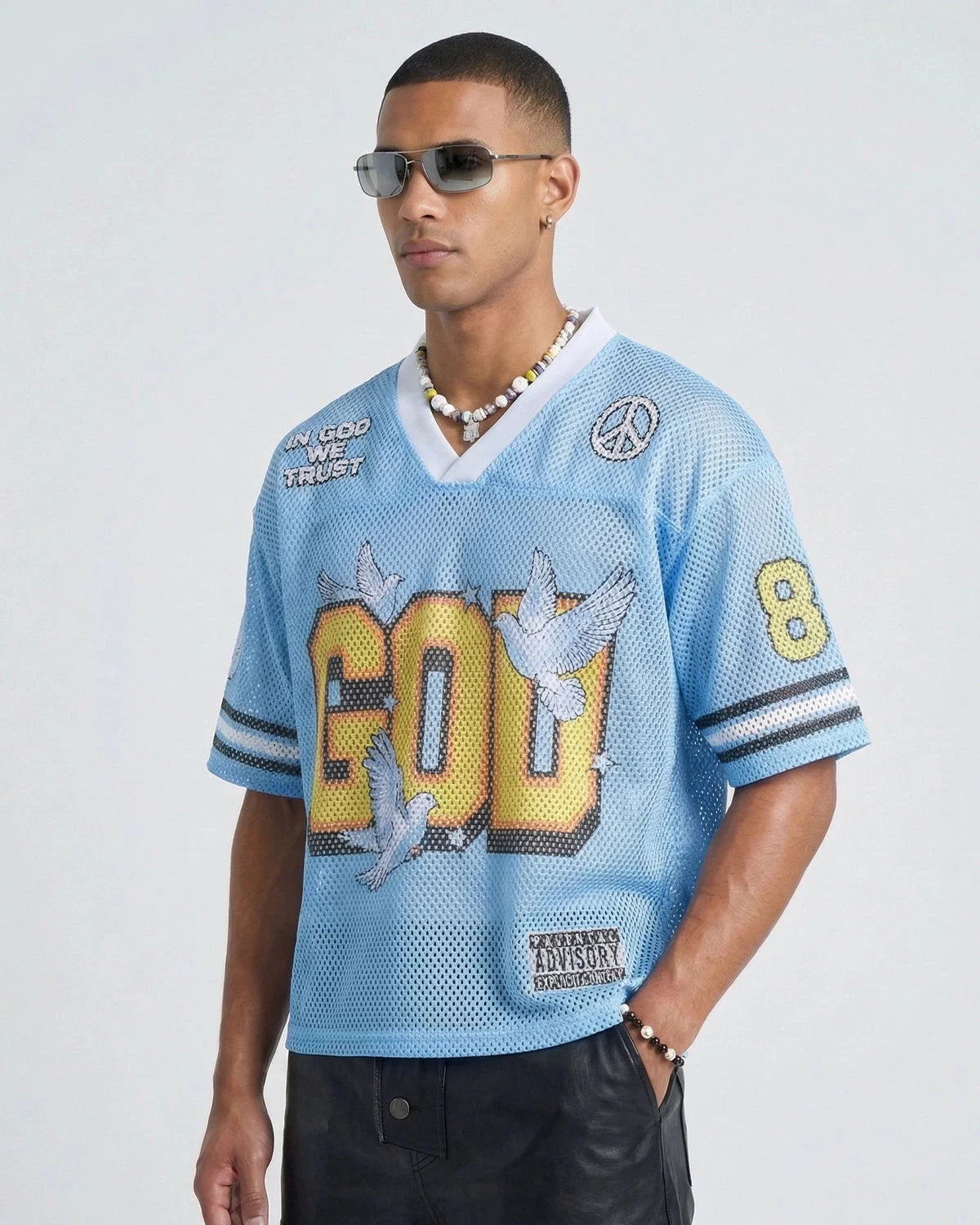 Neckline and sleeve detail of the mesh football jersey