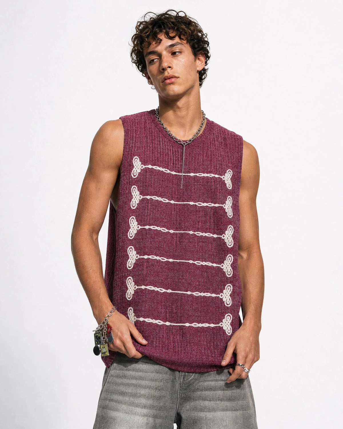 Neckline detail of embroidered knit tank top